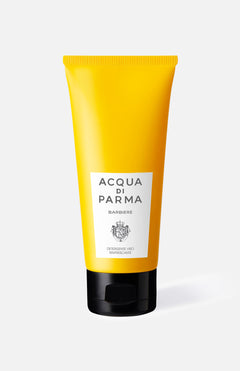A yellow tube of ACQUA DI PARMA Barbiere Refreshing Face Wash with a black cap and white label stands upright against a white background. Made in Italy, it’s perfect for an elevated grooming routine.