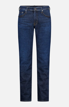 The AG Everett Cloud Soft Jean in dark blue features a slim-straight fit, five pockets, button and zip fly, and contrast stitching, shown against a plain white background.