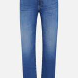 The AG Cloud Soft Everett Jeans in Grove feature a classic dark blue wash, straight-leg cut, five pockets, belt loops, and a button-zipper closure, shown against a white background.