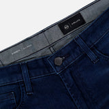 Everett Jeans in Yountville by AG shown laid flat on a white surface, featuring ultra-dark blue denim, slim straight fit, black button closure, front pockets, visible belt loops, and an Airluxe label inside the waistband.