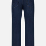 Back view of the AG Graduate Pant in Studio, featuring ultra-dark blue denim with two back pockets, prominent stitching, and a straight leg cut with vintage-inspired details, displayed against a plain white background.
