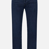 AG’s Graduate Pant in Studio features an ultra-dark blue wash in a straight-leg silhouette, designed with front and back pockets, classic button and zipper closure, and belt loops for a touch of vintage detail, displayed against a plain white background.