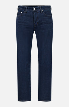 AG’s Graduate Pant in Studio features an ultra-dark blue wash in a straight-leg silhouette, designed with front and back pockets, classic button and zipper closure, and belt loops for a touch of vintage detail, displayed against a plain white background.