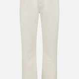 The AG Protege Pants in Pumice are off-white, stretch straight-leg jeans with front and back pockets, belt loops, and button-zip closure. Shown against a plain white background.