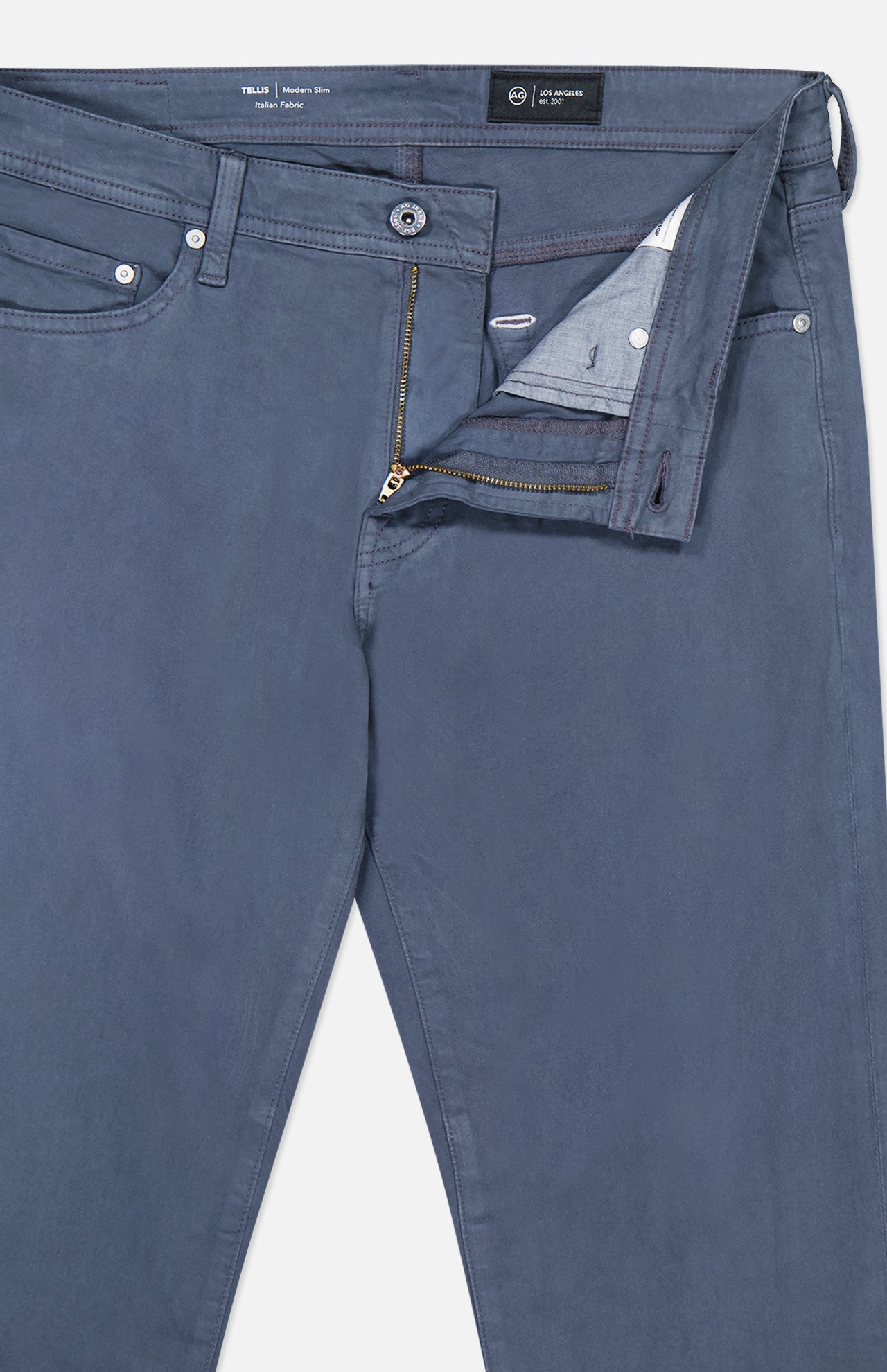 The AG Tellis Sueded Sateen Pants in Blue Grain feature a button and zipper closure, belt loops, front pockets, a microsuede finish, and waistband lining.