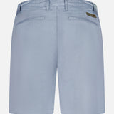 The AG Wanderer 8.5" Inseam Shorts for men in light blue feature belt loops, two back welt pockets, a branded patch above the right pocket, and a slim fit for a modern, refined look.
