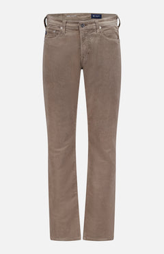The AG Protege Corduroy Pant in light brown features a relaxed, straight-leg fit, five pockets, belt loops, and a button closure. Shown against a plain white background.