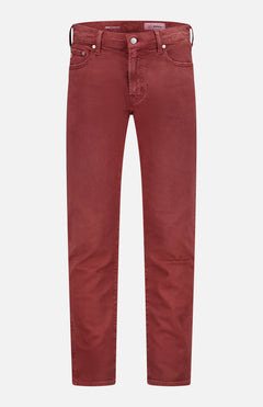 The AG Tellis Colored Cloud Soft Pants are straight-leg, five-pocket jeans in dark red-wine with a velvety finish, shown against a plain white background.