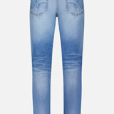 The AG Tellis Aged Jeans are slim-fit, light blue denim with vintage-inspired fading at the thighs and knees, subtle back pocket stitching, a leather waistband patch, and classic style shown from the back.