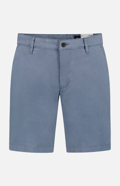 The AG Wanderer Short is a light blue, slim fit style for men with belt loops, front button and zip closure, side pockets, and a clean design. Displayed against a plain white background.