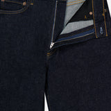 Harper Jean in Reissue by AGOLDE shown in a dark indigo wash with a visible front zipper and button undone, revealing the inner waistband and pocket lining. The AGOLDE label is displayed on the inside waistband. These relaxed mid-rise jeans feature a straight leg silhouette for timeless appeal.