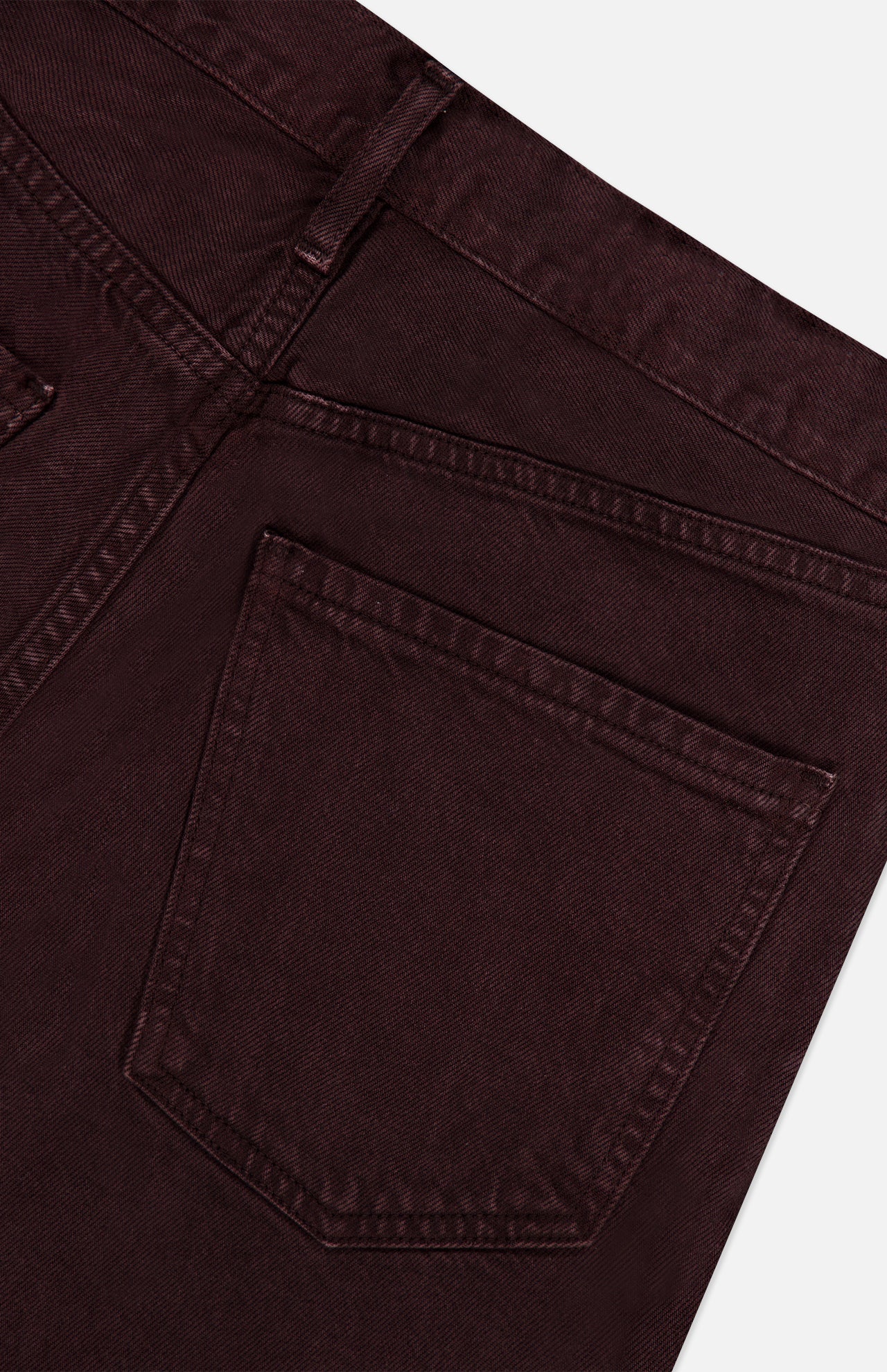 Close-up of the back pocket and waistband of the AGOLDE Ren Jean in Sloe Berry, highlighting the stitching details and fabric texture against a white background.