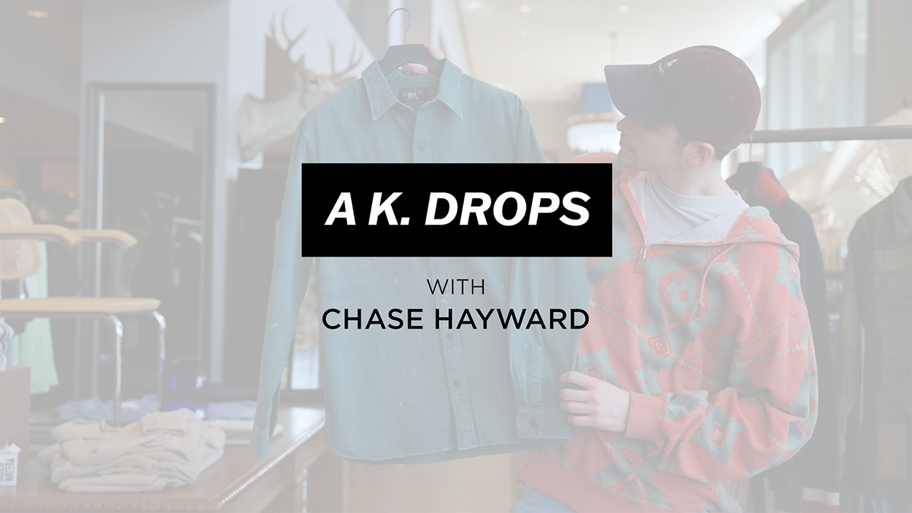 image with text "A.K. Drops with Chase Hayward" image is of personal shopper chase hayward holding up a green button up from ralph lauren