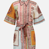 The Alberta Mini Linen Dress by ALEMAIS is a short-sleeved, belted shirtdress with a vibrant patchwork of brown, rust, green, yellow, and blue prints—perfect as a breezy beach dress.