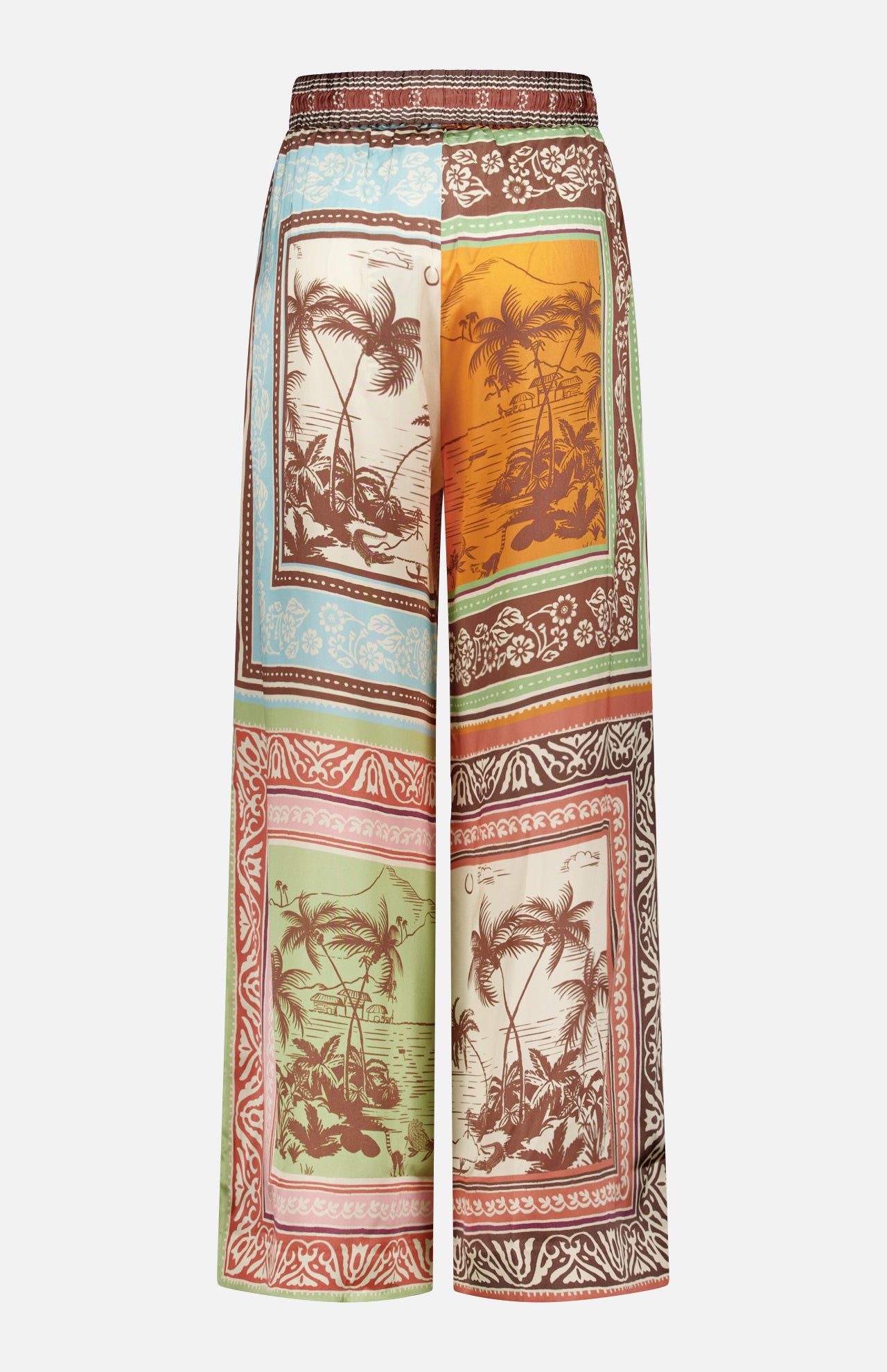 The Alberta Silk Pull-on Pant by ALEMAIS features a wide-leg, relaxed fit and showcases tropical island scenes, palm trees, and ocean views in earthy tones, bordered with patterned frames for a bohemian look.