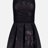 The Chara Embellished Neckline Sleeveless Mini Dress by ALICE + OLIVIA features a fitted sheer top, pleated jacquard skirt, and a pearl and gem-adorned neckline for an elegant formal look.