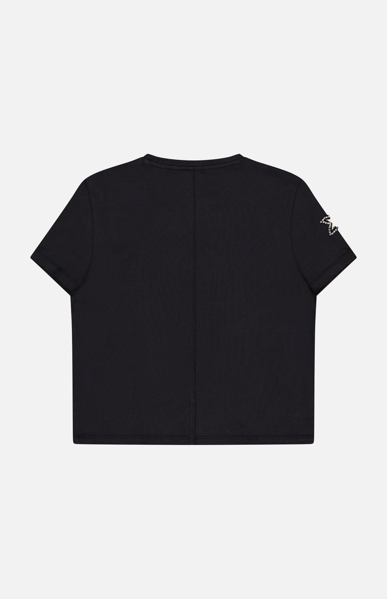 The Cindy Cropped T-shirt With Crystal Star Cutouts by ALICE + OLIVIA is shown from the back, featuring star-shaped cutouts and crystal details. Perfect for a women's night out, styled against a plain white background for a fresh look.