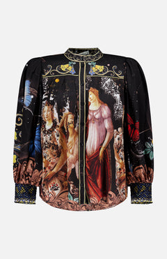 The Cora Voluminous Long Sleeve Blouse by ALICE + OLIVIA is a black satin top with blouson sleeves, featuring a vibrant Renaissance-inspired print of women, flowers, and butterflies, plus embroidered cuffs and collar for an elegant touch.