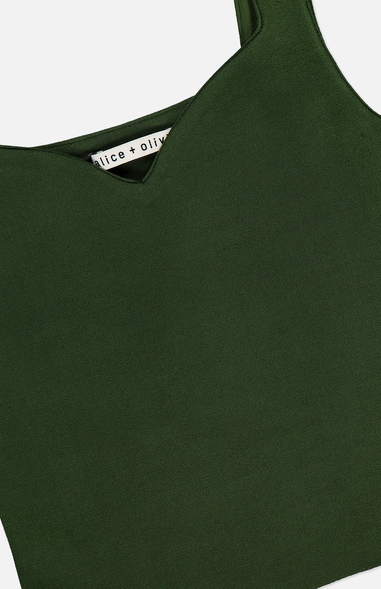 A close-up of the ALICE + OLIVIA Edin Sweetheart Tank Top, a sleeveless dark olive cropped style featuring a subtle sweetheart neckline.