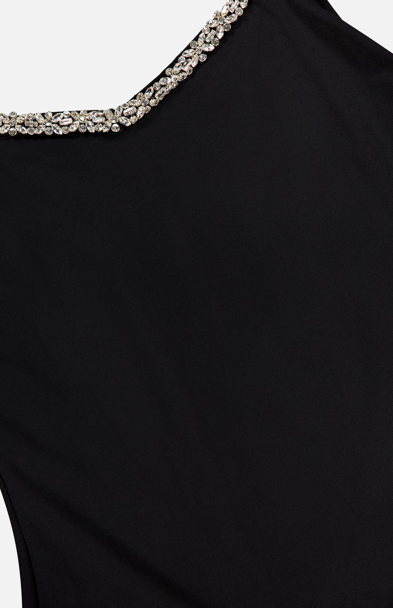 Close-up of the ALICE + OLIVIA Eve Embellished Trim Sweetheart Mini Dress, showcasing its black fabric and a neckline decorated with sparkling rhinestones in an elegant pattern against a plain light background.