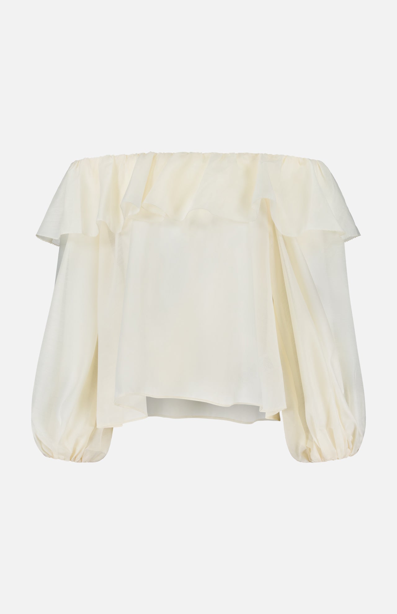 ALICE + OLIVIA’s Alta Off The Shoulder Ruffle Blouse features a cream hue, ruffled neckline detail, billowy long sleeves made of sheer organza, and a loose, flowy silhouette.