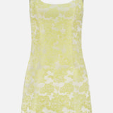 The Charlotte Scoop Neck Mini Dress by ALICE + OLIVIA is a butter yellow metallic floral jacquard mini dress with a scoop neckline, subtle seam detailing, and adjustable straps featuring metallic buckles for a custom fit.