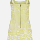 The Charlotte Scoop Neck Mini Dress by ALICE + OLIVIA features a sleeveless butter yellow design with metallic floral jacquard, adjustable straps, square neckline, and front zipper closure. Displayed on a white background; perfect for cocktail parties.