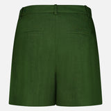 Back view of the ALICE + OLIVIA Conry Relaxed Long Pleated Short in dark green, featuring belt loops and two welt pockets, displayed on a plain white background. These relaxed fit shorts provide versatile comfort and effortless style for any casual wardrobe.