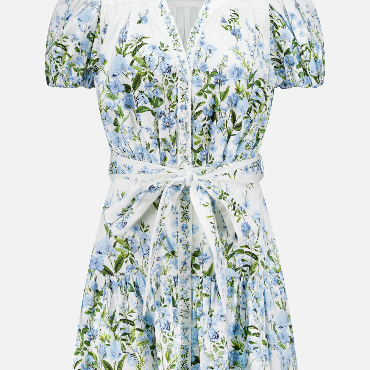 The ALICE + OLIVIA Cora Short Sleeve Tiered Mini Shirt Dress features a blue and green floral print, V-neckline, front buttons, gathered waist, and a matching fabric belt tied at the front.