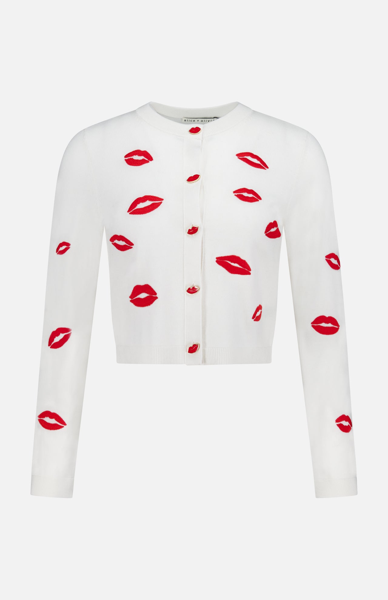 The ALICE + OLIVIA Daroda Lip Cardigan Sweater features long sleeves, red buttons, and playful embroidered red lipstick kiss prints.