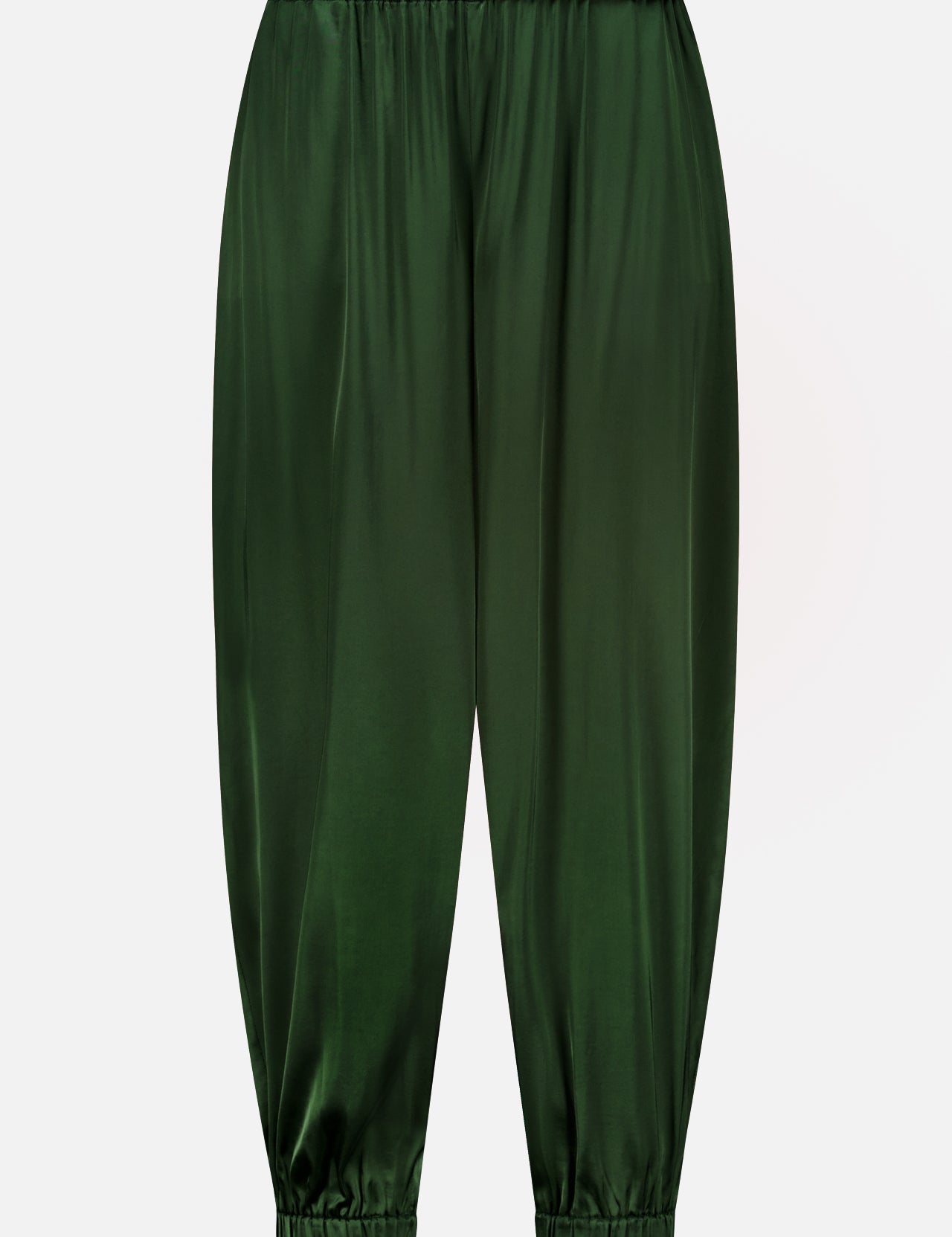 The Declan Pull On Genie Pant by ALICE + OLIVIA is crafted from exceptionally smooth and shiny dark green satin charmeuse, featuring an elastic waistband and elastic cuffs for a classic genie pant silhouette. Shown against a plain white background.