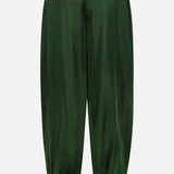 ALICE + OLIVIA Declan Pull On Genie Pant in dark green silky charmeuse, featuring an elastic waistband and elastic cuffs, displayed on a plain white background.