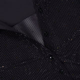 Close-up of the Freya Embell Fitted Nipped Waist Shirt by ALICE + OLIVIA: a black blouse with subtle shimmer, small perforations, and elegant collar and button details.
