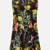 The Julia Scoop Neck Mini Dress by ALICE + OLIVIA is a sleeveless black mini dress featuring a square neckline and a vibrant floral pattern with yellow, red, orange, and purple flowers accented by green leaves. Crafted from stretchy twill fabric, this dress combines comfort and style for any occasion.