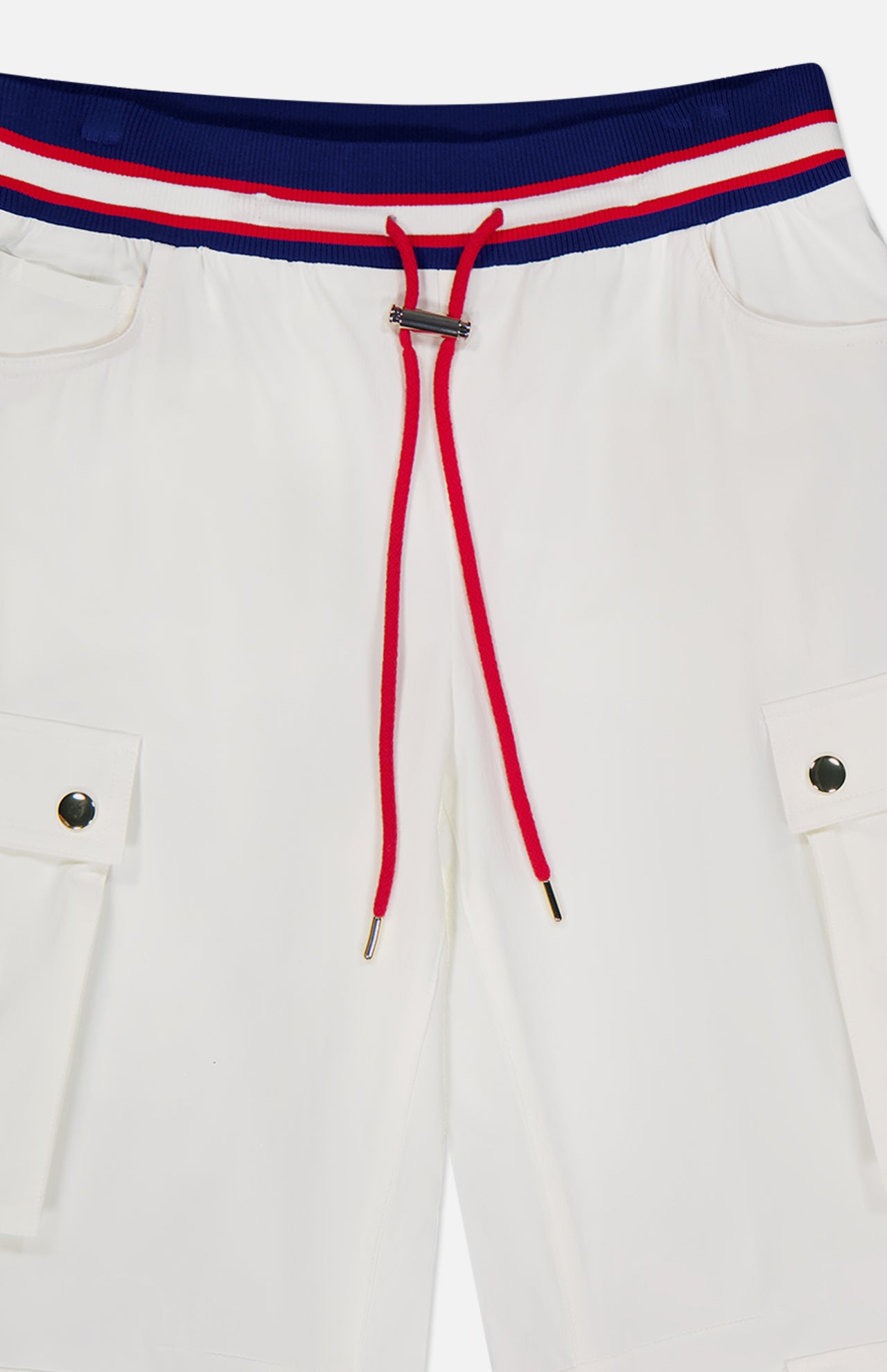 The Olympia Mr Baggy Cargo Pant With Side Stripe by ALICE + OLIVIA features white cargo pants with a blue, white, and red striped elastic waistband, a red drawstring with metal tips, and sporty metal-detailed cargo pockets.