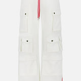 The ALICE + OLIVIA Olympia Mr Baggy Cargo Pant With Side Stripe features a relaxed wide-leg fit, six flap pockets, red drawstring, and a striped waistband in red, blue, and white for a sporty look.