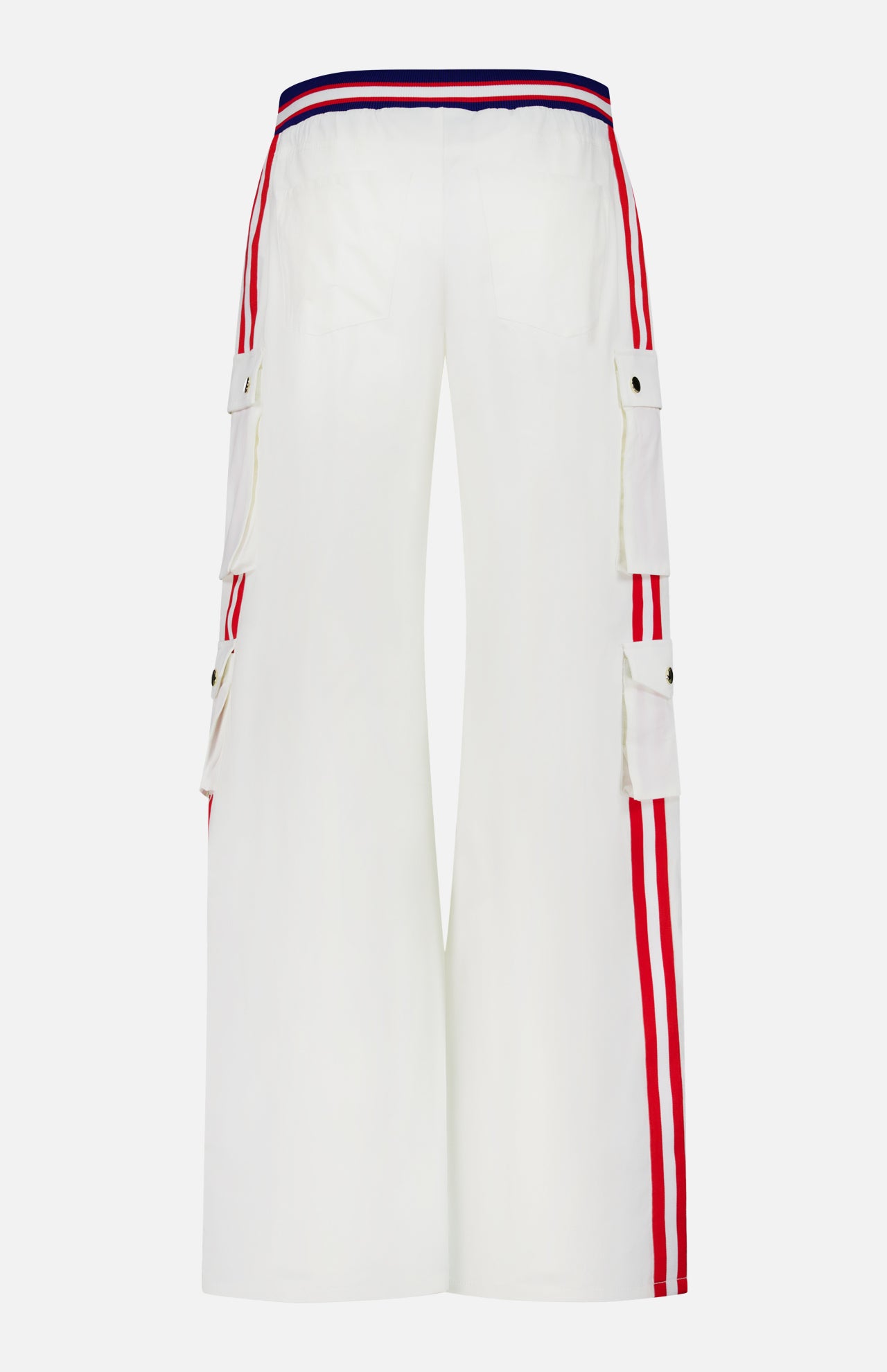 The image shows the Olympia Mr Baggy Cargo Pant With Side Stripe by ALICE + OLIVIA, featuring a white wide-leg design, red vertical side stripes, cargo pockets with button flaps, and a red, white, and blue striped waistband.