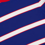 Close-up of the ALICE + OLIVIA Onie Baby Ringer T-shirt, showcasing ribbed fabric with blue, white, and red stripes, a red neckline, and a visible brand label—this vintage-inspired top adds playful charm to any baby wardrobe.