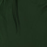 Close-up of the ALICE + OLIVIA Rita Draped Cropped Top with Scarf in dark green silk charmeuse, featuring gentle folds and creases that create subtle shadows and a textured effect across its smooth surface.