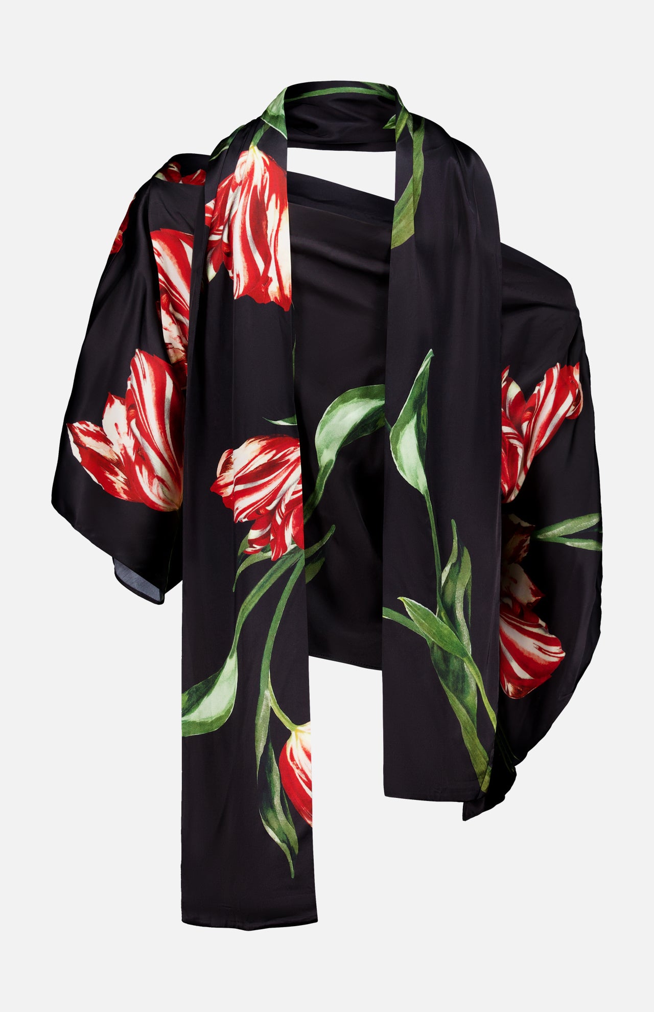 Introducing the Rita Off The Shoulder Draped Top with Scarf by ALICE + OLIVIA—a cropped, off-the-shoulder black top crafted from luxurious floral silk charmeuse, adorned with vibrant red and white tulip prints and green leaves, elegantly showcased against a plain white background.