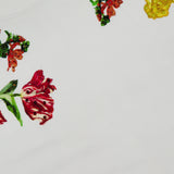 The Russell Embellished Relaxed Crewneck Sweatshirt by ALICE + OLIVIA features a cropped white design adorned with colorful embroidered flowers—red, yellow, and orange blooms with green leaves—arranged near the collar, and finished with delicate sequin embroidery for extra sparkle.