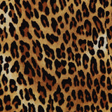 Close-up of a leopard print fabric, featuring black irregular spots on a golden-yellow and tan background—ideal for crafting the Wendy Fit And Flare Godet Mini Dress by ALICE + OLIVIA.
