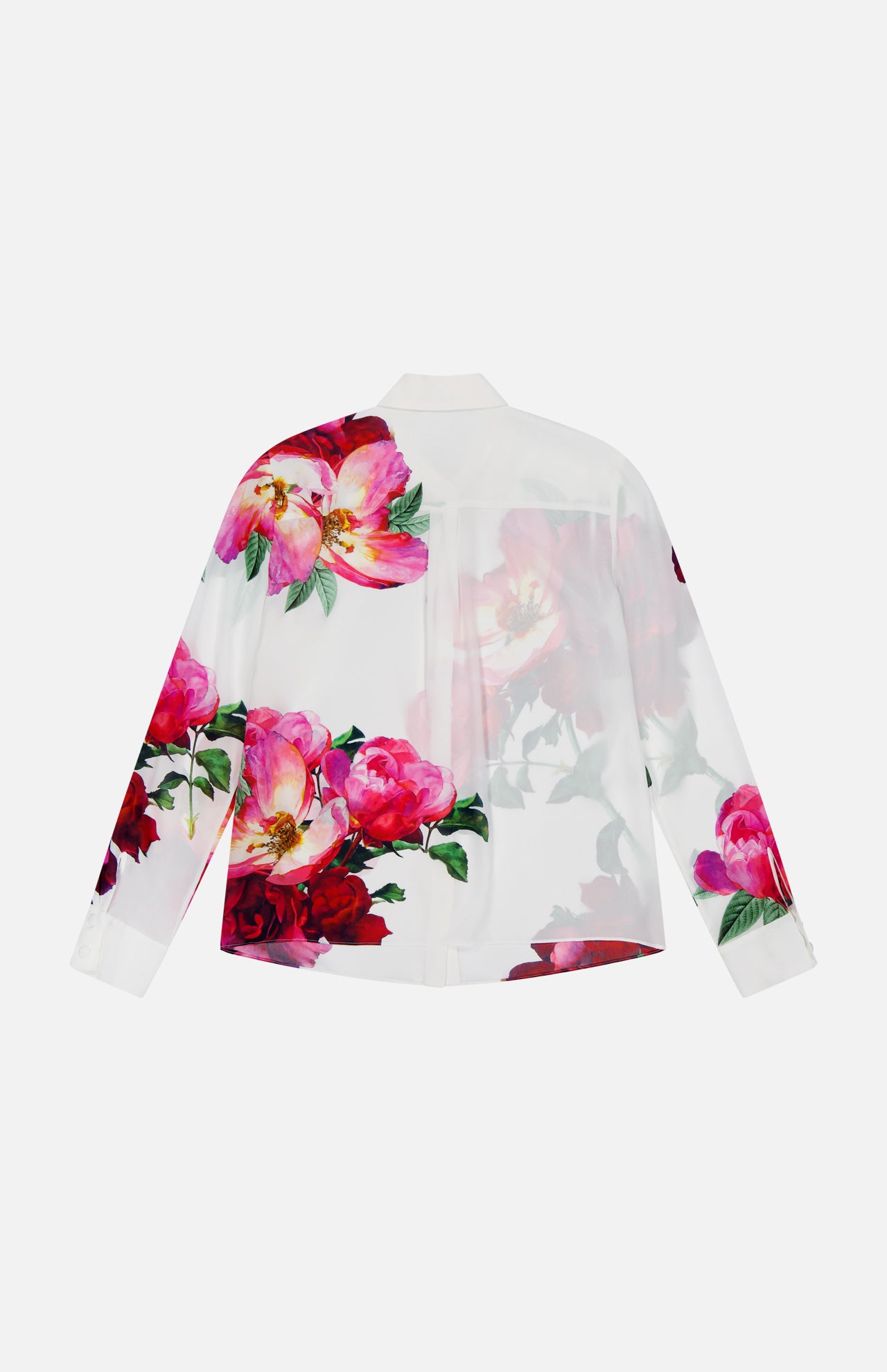 The ALICE + OLIVIA Willa Hidden Placket Silk Top is a white long-sleeve button-up shirt with bold pink and red floral prints and green leaves on the back and sleeves, set against a plain white background.