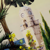 A watercolor painting of a stone clock tower amid greenery and flowers, with a blue sky and sea, evokes the scenic look of the Wynell Staceface Fitted Mini Dress by ALICE + OLIVIA—perfect for summer days.