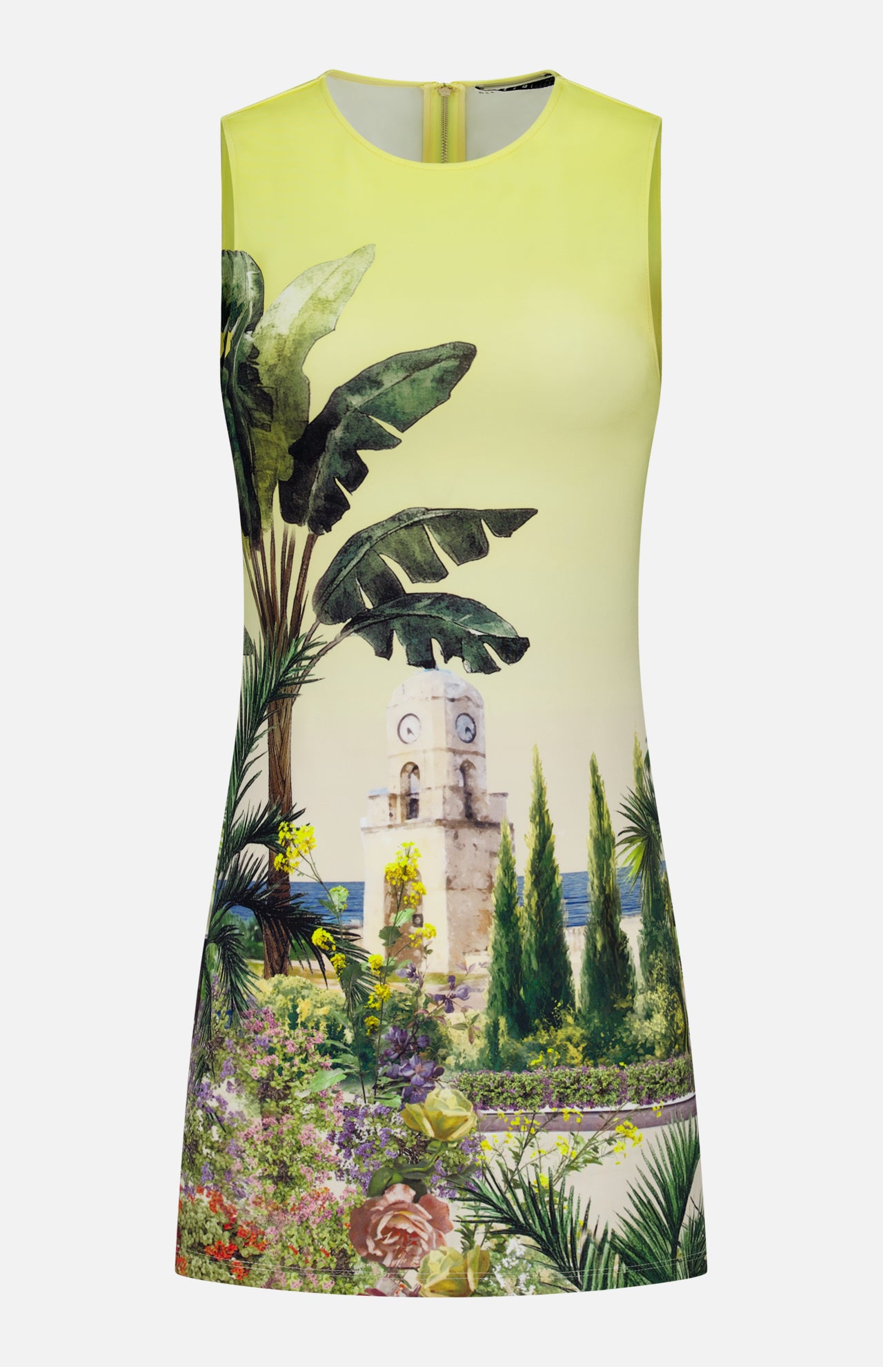 The Wynell Staceface Fitted Mini Dress by ALICE + OLIVIA is a sleeveless yellow mini dress showcasing a scenic print with tropical plants, flowers, trees, a stone clock tower, and sea views—perfect for effortless summer style.