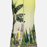 The ALICE + OLIVIA Wynell Staceface Fitted Mini Dress is a sleeveless yellow mini dress with a back zipper, showcasing a vivid scenic print of a clock tower, palm trees, tropical plants, and colorful flowers for vibrant charm.