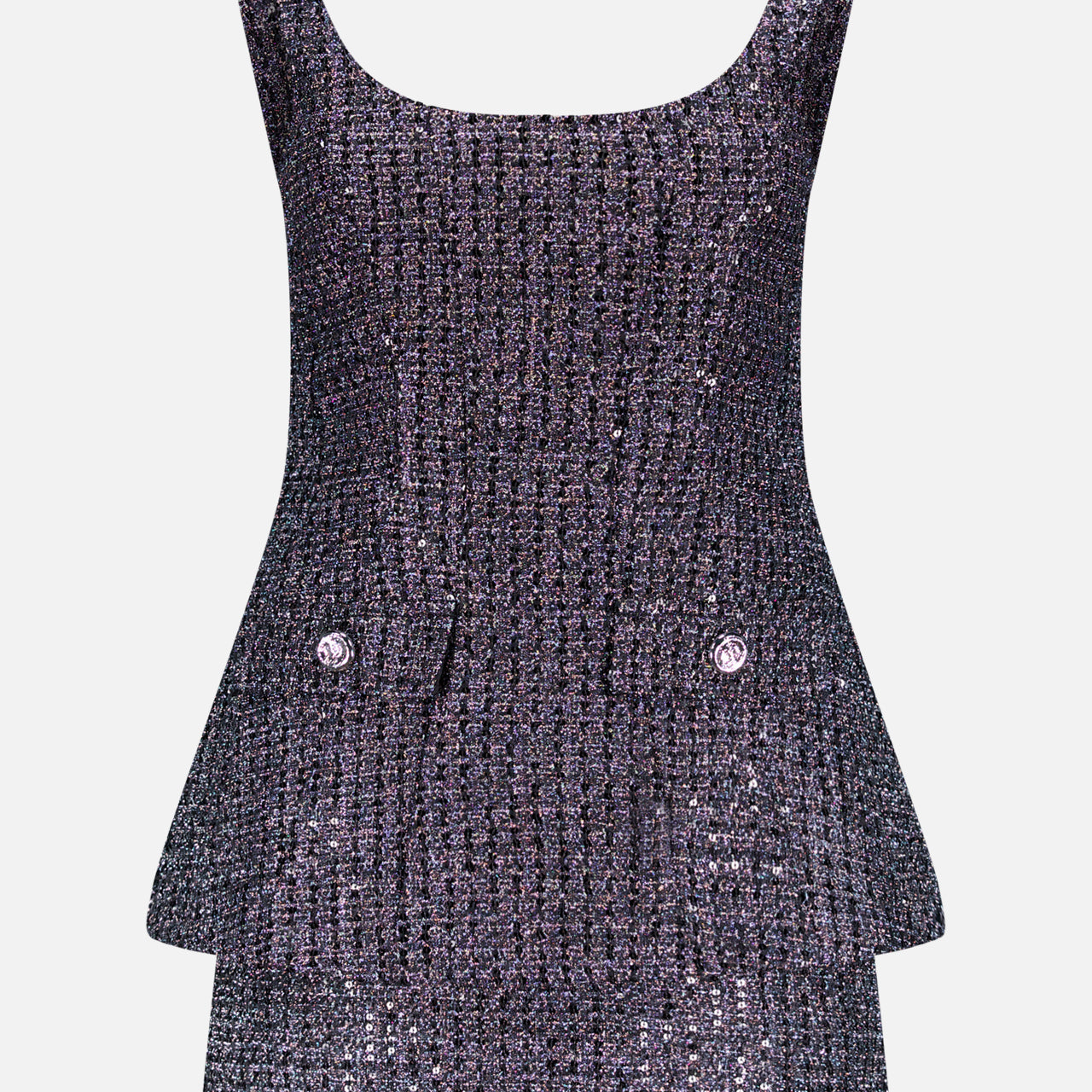 The Empire Sparkle Tweed Mini Dress by AMANDA UPRICHARD features a sleeveless design in black and silver tweed, a fitted bodice, scoop neckline, peplum waist, and two front flap pockets with decorative buttons.