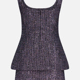 The AMANDA UPRICHARD Empire Sparkle Tweed Mini Dress features a sleeveless, scoop-neck design with a fitted peplum waist and sparkly purple textured fabric, offering a playful take on the classic cocktail look. Displayed on a white background.