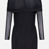 The Rosalyn Drape Shoulder Mini Dress by AMANDA UPRICHARD is a black mini dress with elegant draping, a fitted silhouette, sheer mesh sleeves and overlay at the shoulders and chest, and a chic back zipper closure.