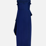 A back view of the Alessandra Ruffle Maxi Dress by AMANDA UPRICHARD: an ankle-length royal blue dress with a sleeveless halter neckline, fitted waist, ruched side detail, and draped sash.